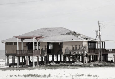 wind damage - spray foam can help prevent uplift to Athens roofs